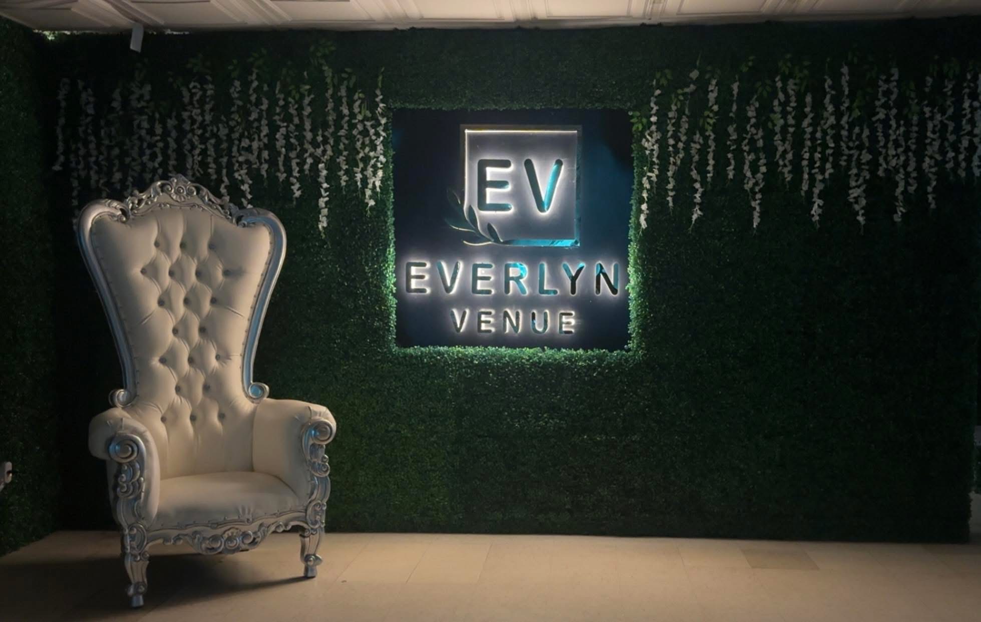 Everlyn Venue signature greenery wall and throne chair